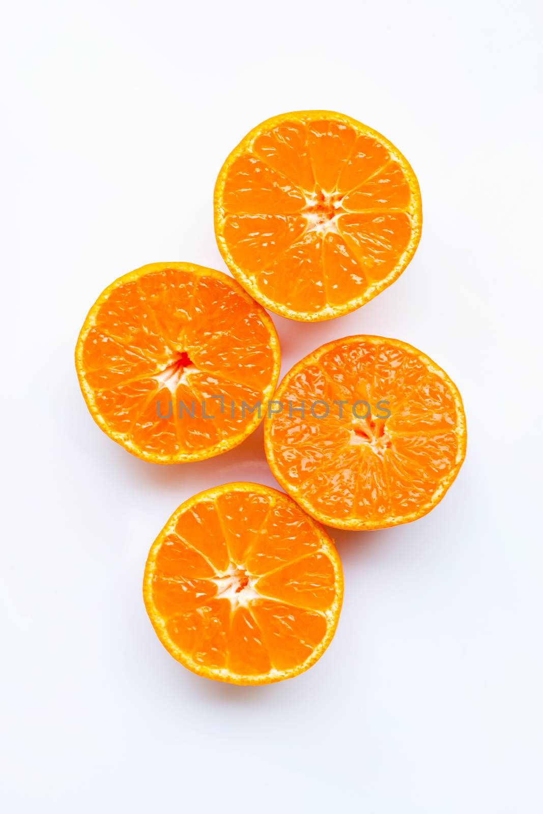 Orange fruits on a white background. Top view