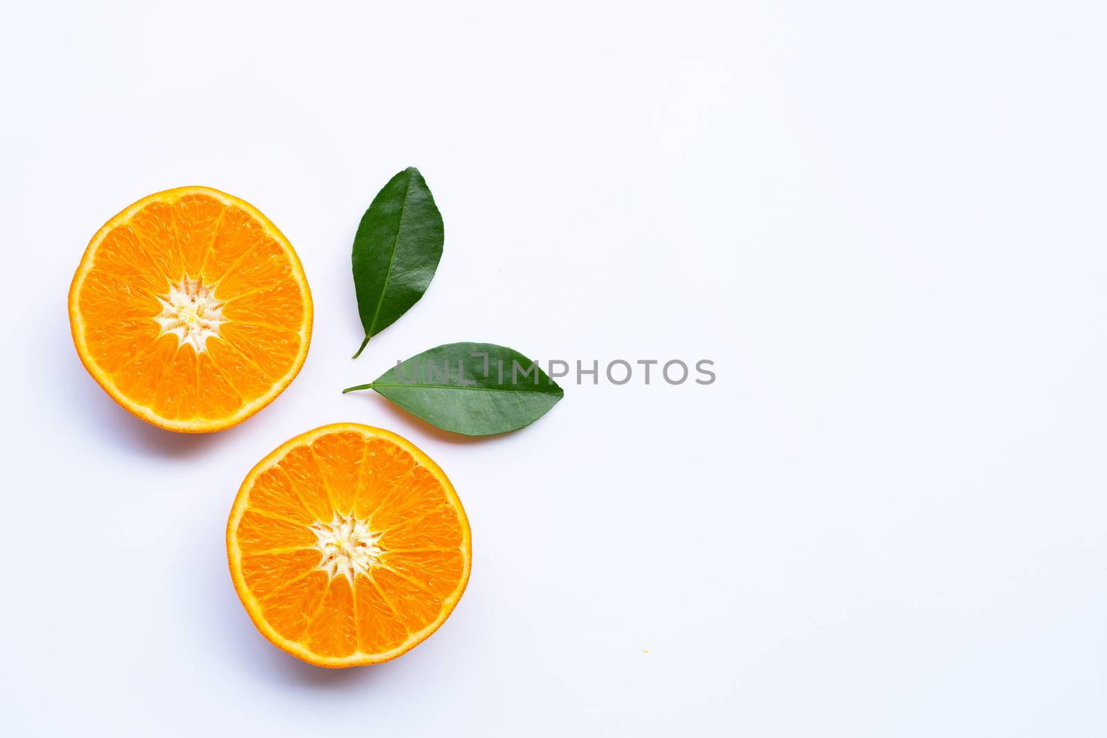 Fresh orange citrus fruits with leaves on white background. Copy space