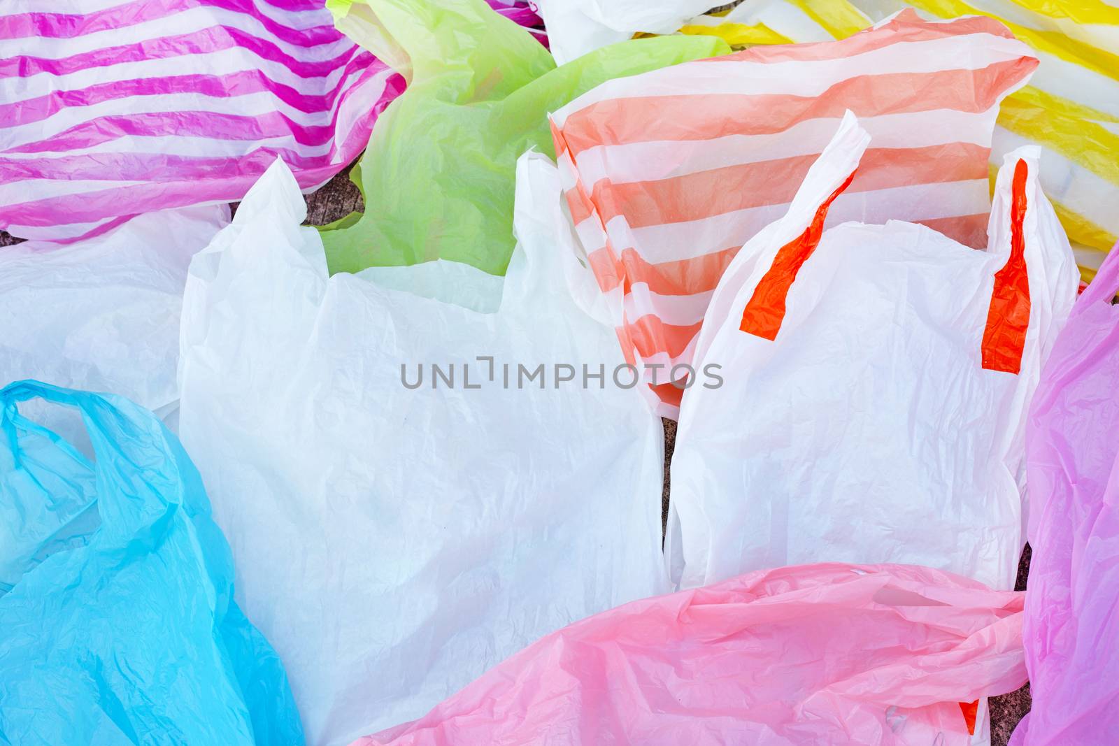 Plastic garbage bags on cement floor. Top view