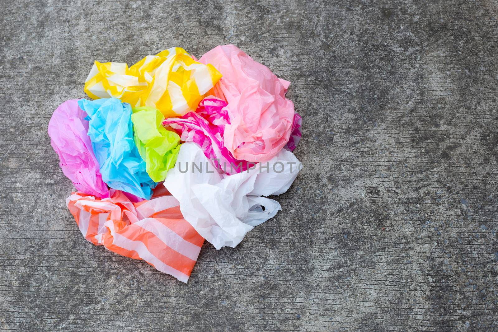 Plastic bags waste on  cement floor background