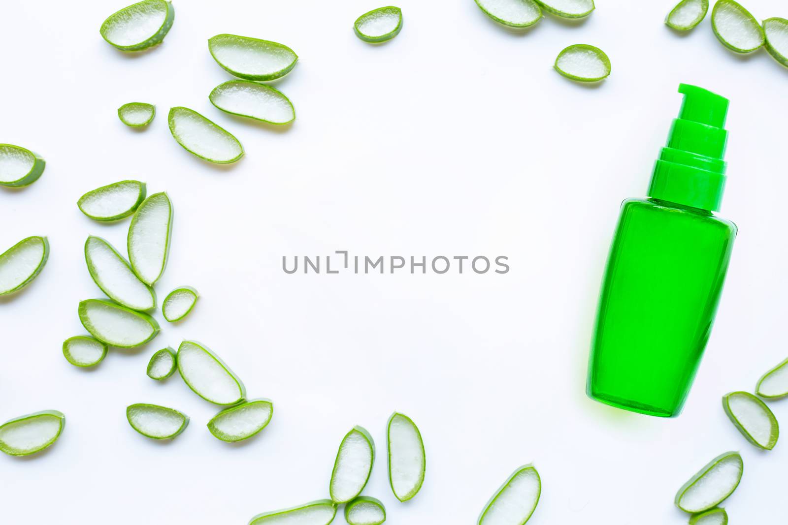 Bottle of products for spa or skin care cosmetic aloe vera gel and Aloe vera slices isolated on white background