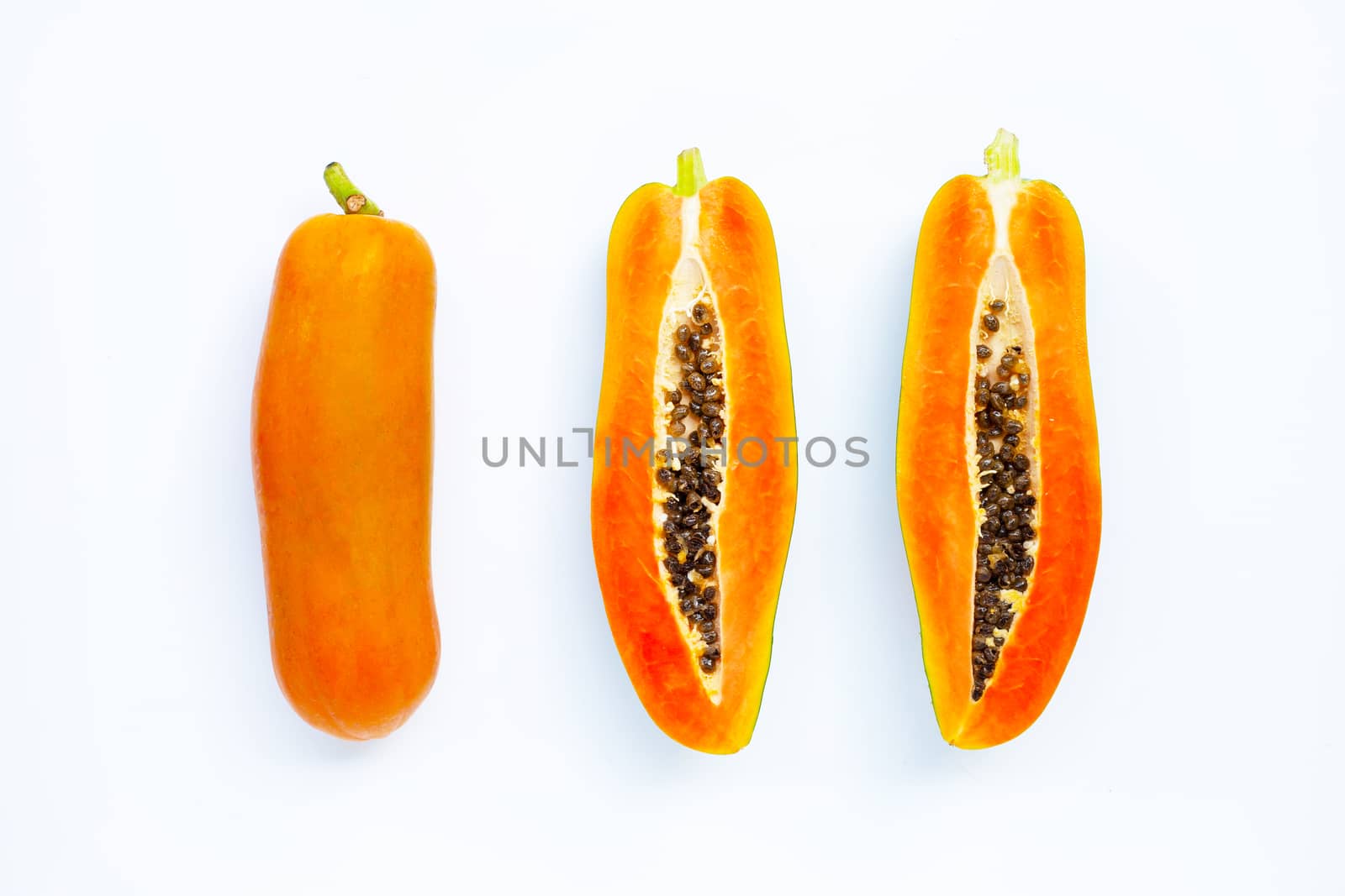 Papaya fruit on white background. Top view