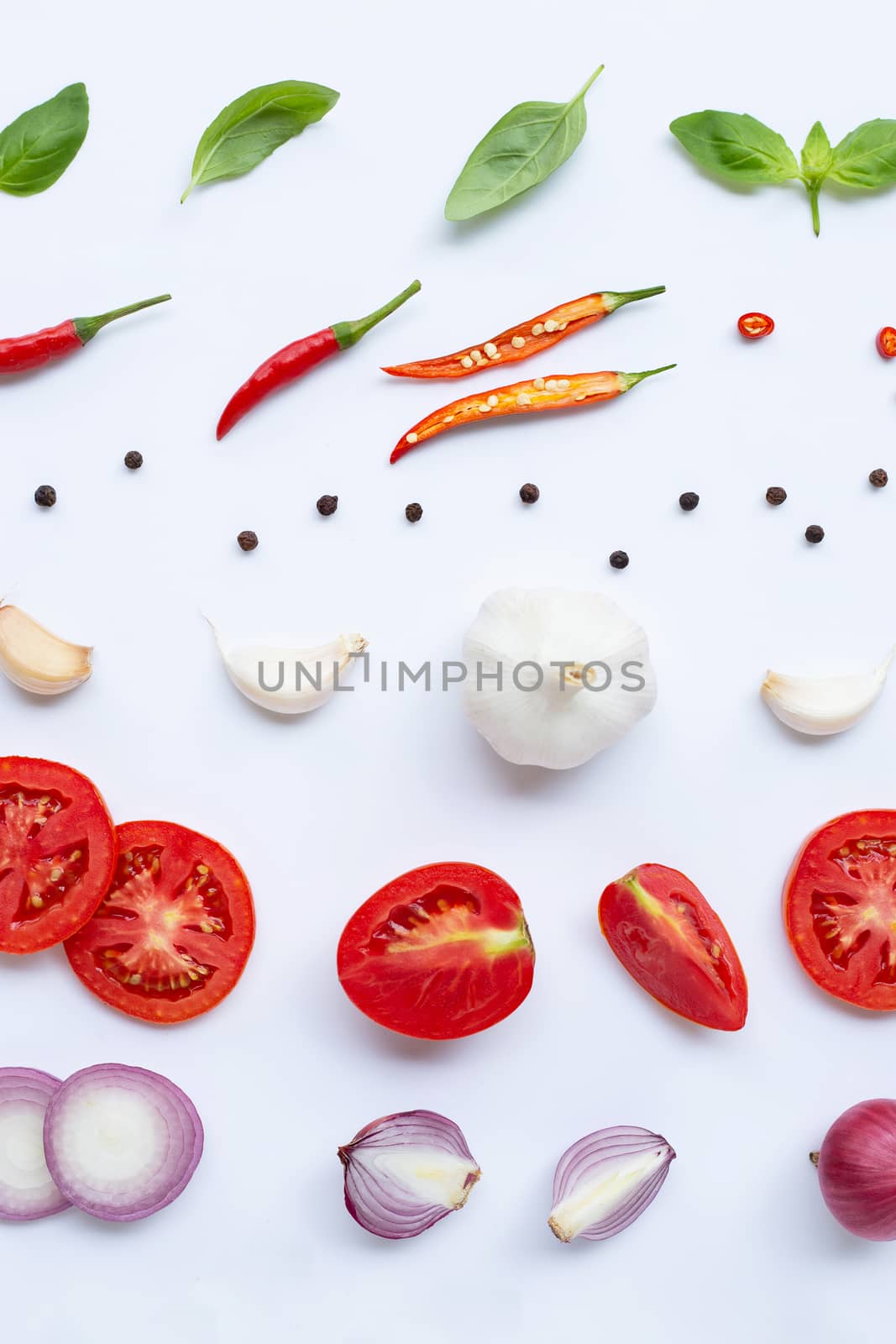 Various fresh vegetables and herbs on white background. Healthy eating concept