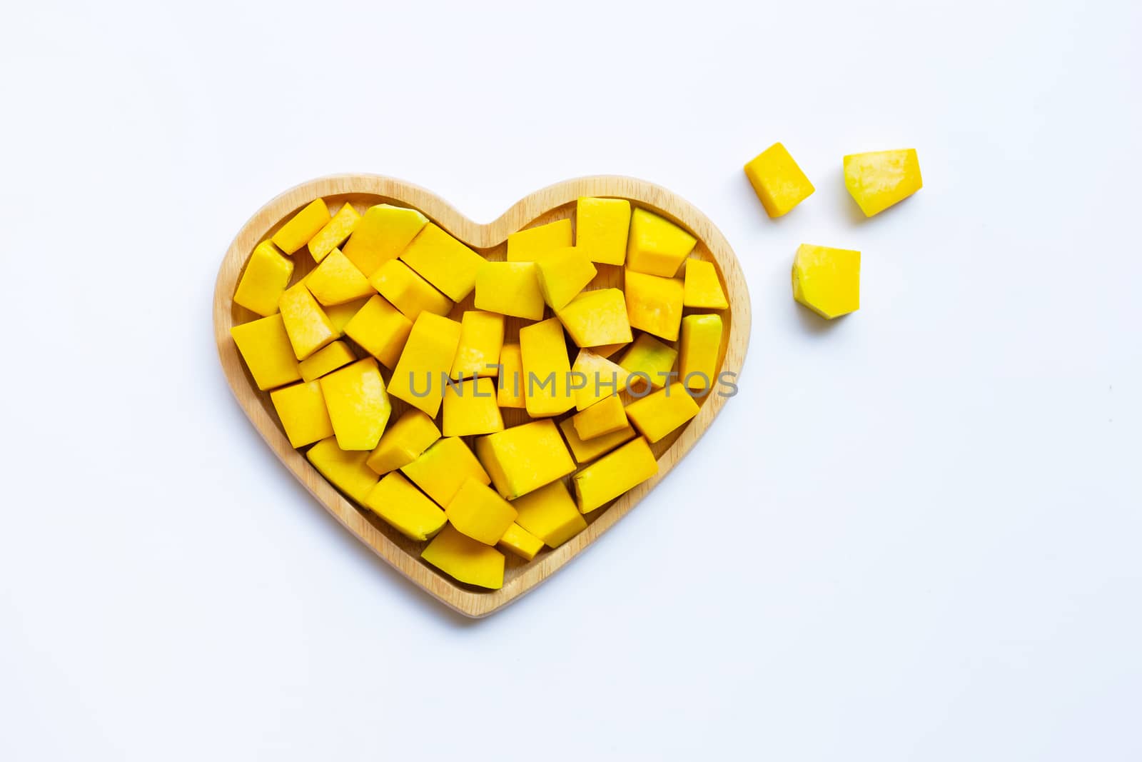 Green pumpkin pieces cut on white background