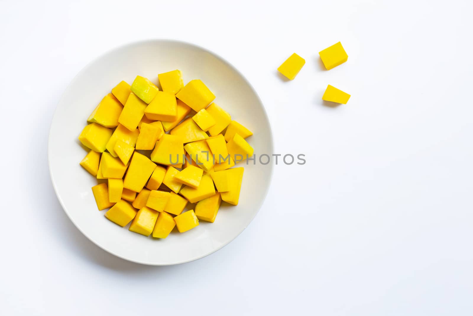 Green pumpkin pieces cut on white background