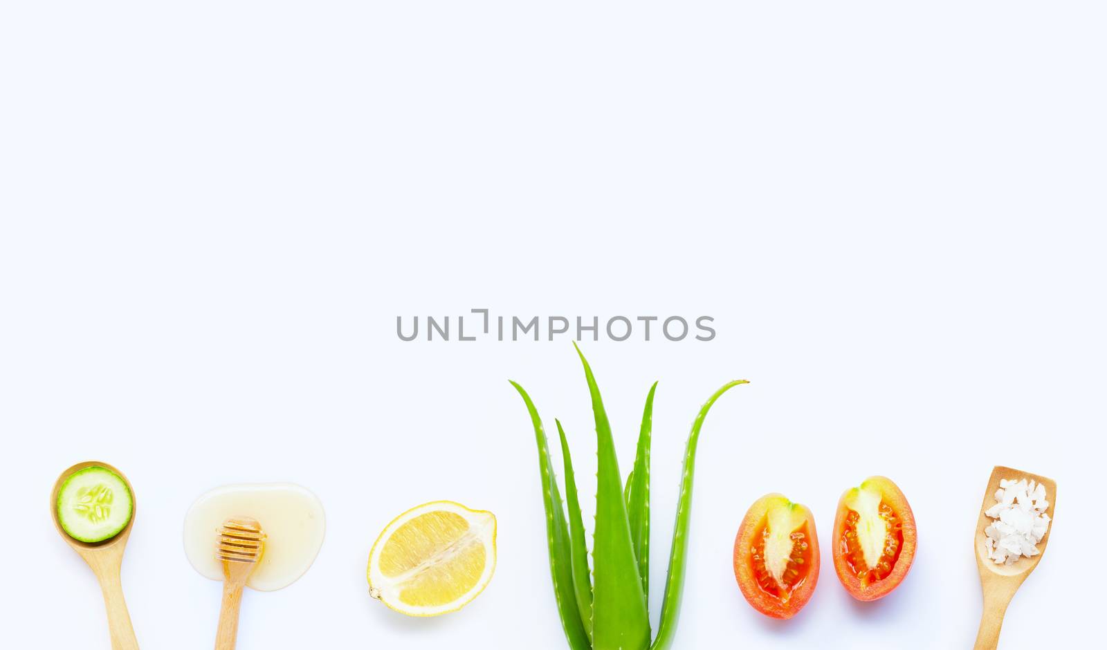 Natural ingredients for homemade skin care on white
