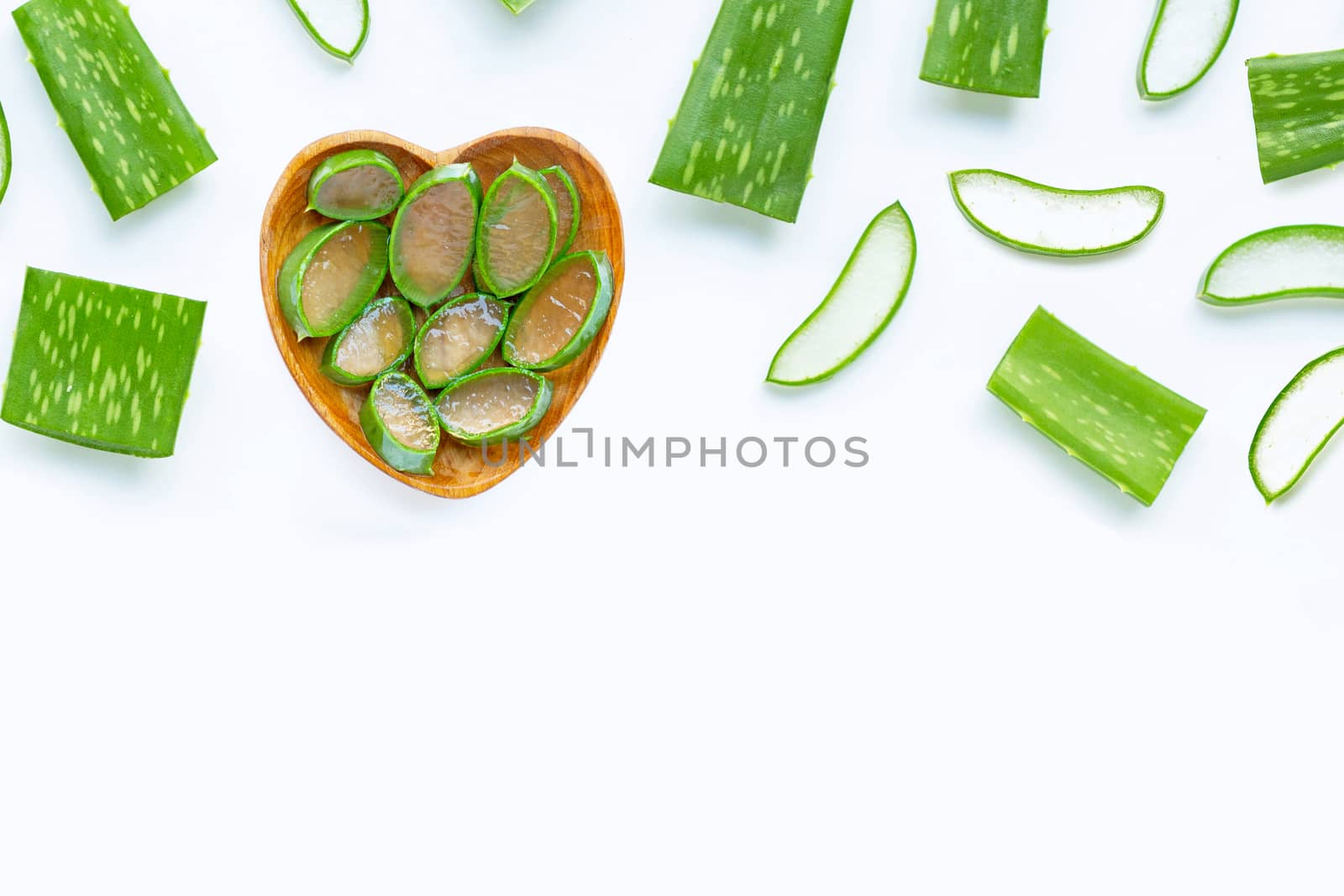 Aloe vera is a popular medicinal plant for health and beauty, white background. Copy space