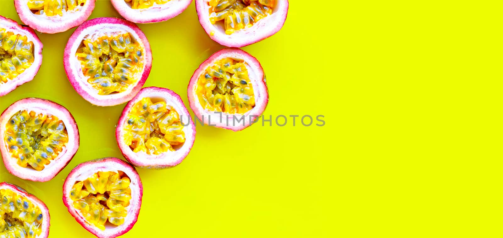 Passion fruit on yellow background.  by Bowonpat