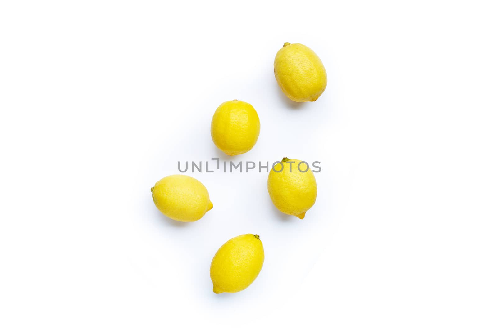 Fresh lemon on white background. Copy space