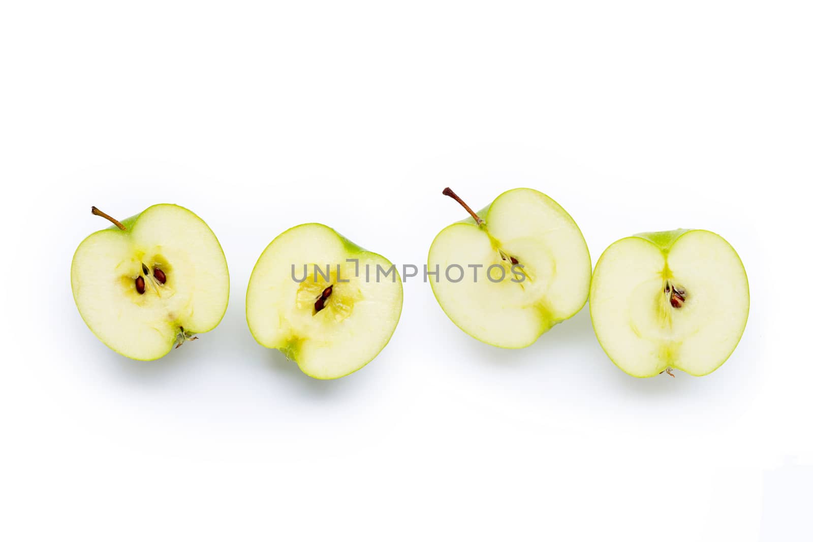 Green apples on white background. Copy space
