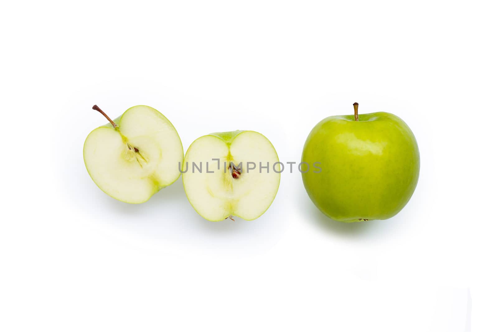 Green apples on white background. Copy space