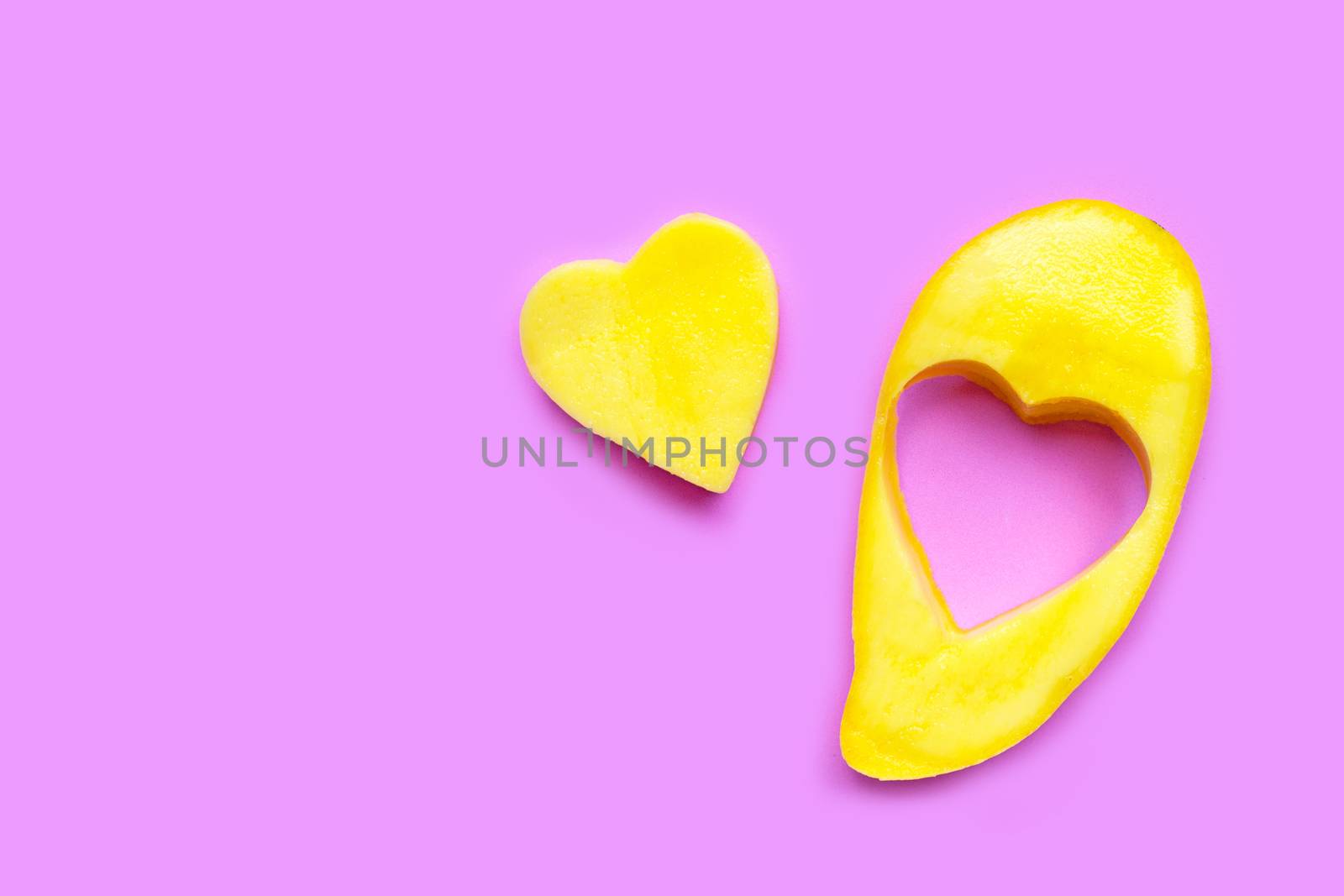 Tropical fruit, Mango  on pink background. Copy space