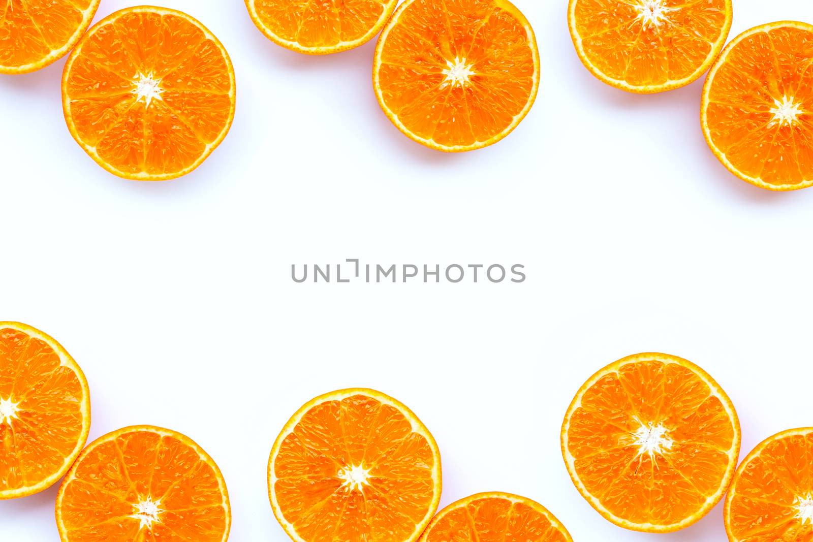 High vitamin C,  Frame made of Juicy orange fruit on white background. Copy space