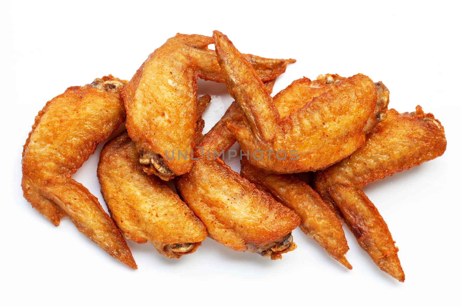 Fried chicken wings on white background.  