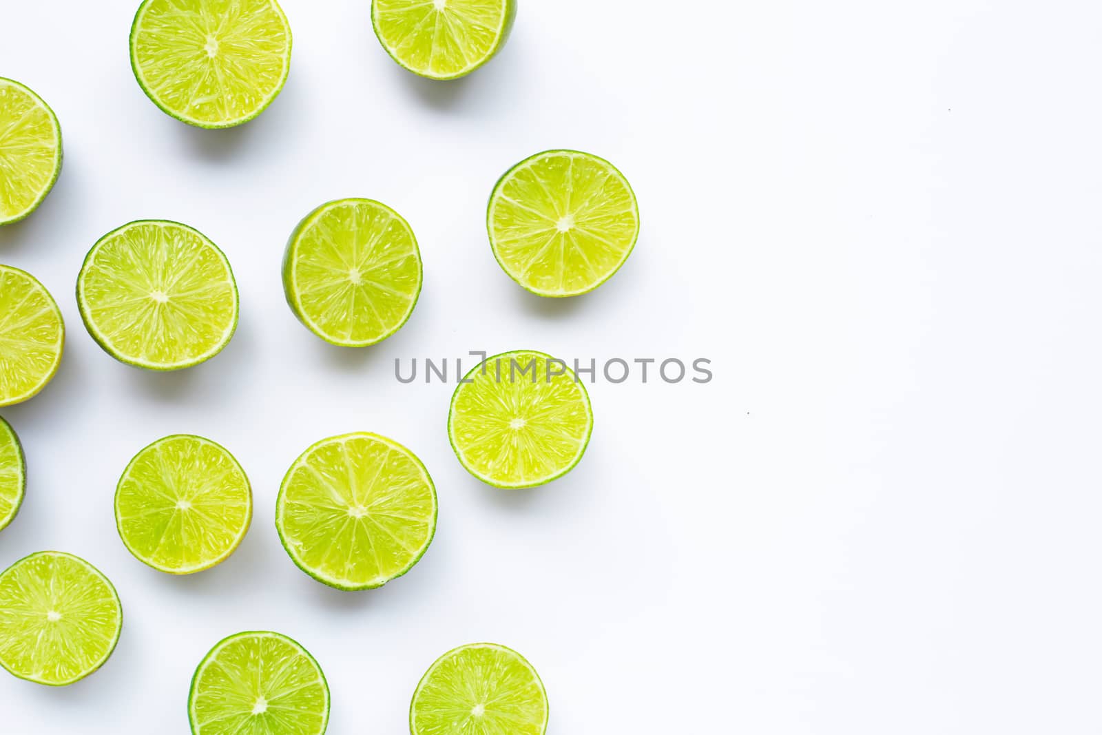 Limes isolated on white background. Copy space