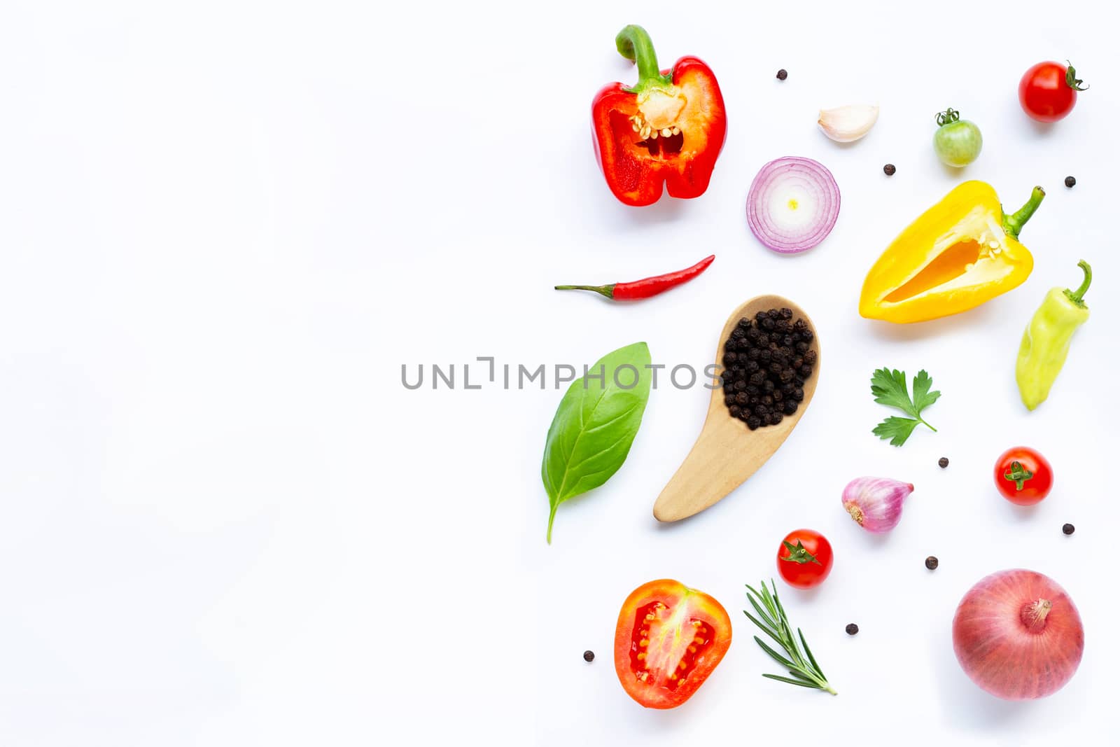 Various fresh vegetables and herbs on white background. Healthy eating concept. Copy space