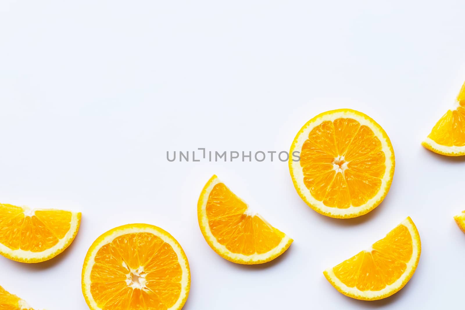 Fresh orange slices on white background. Copy space