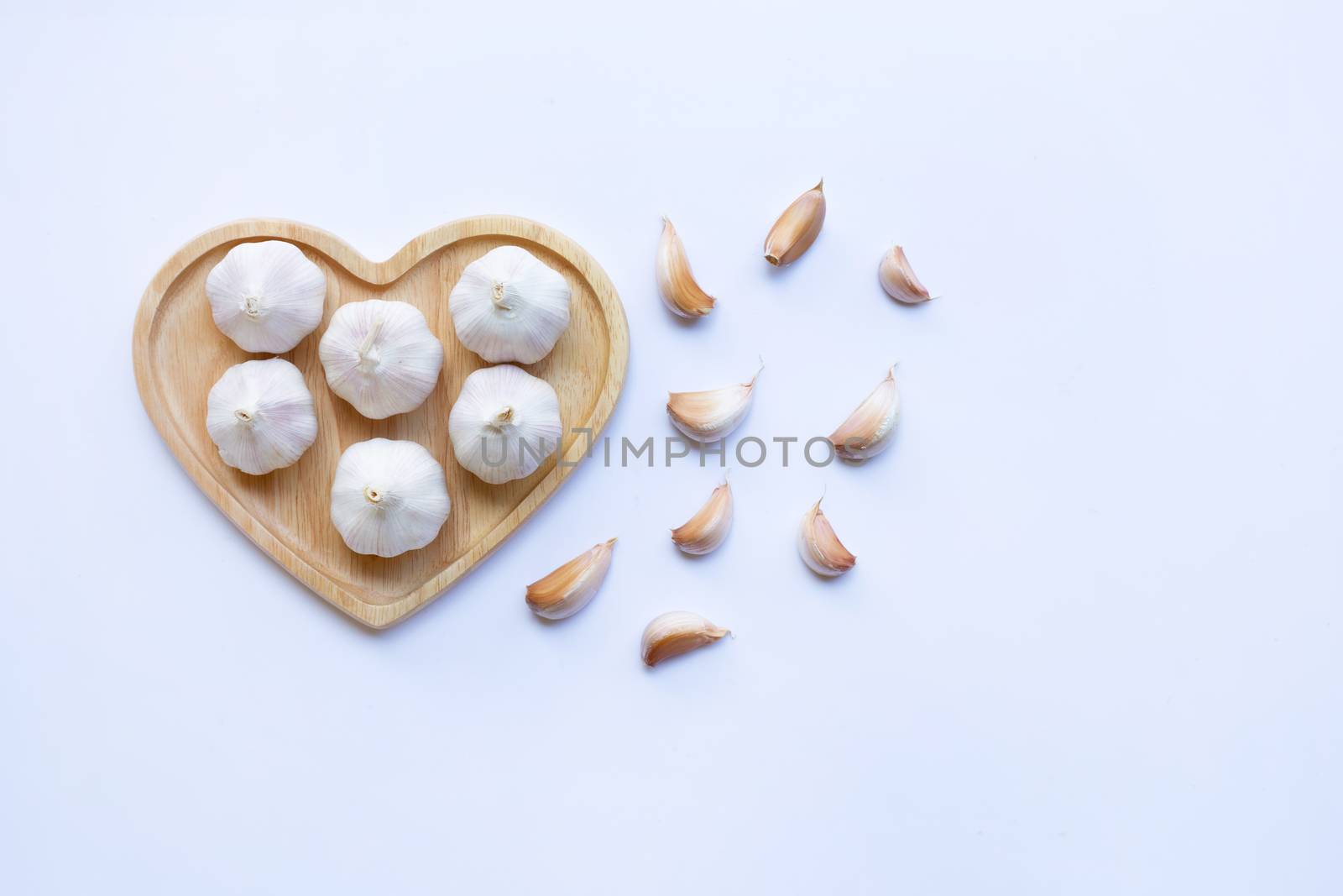 Garlic on white background. Copy space