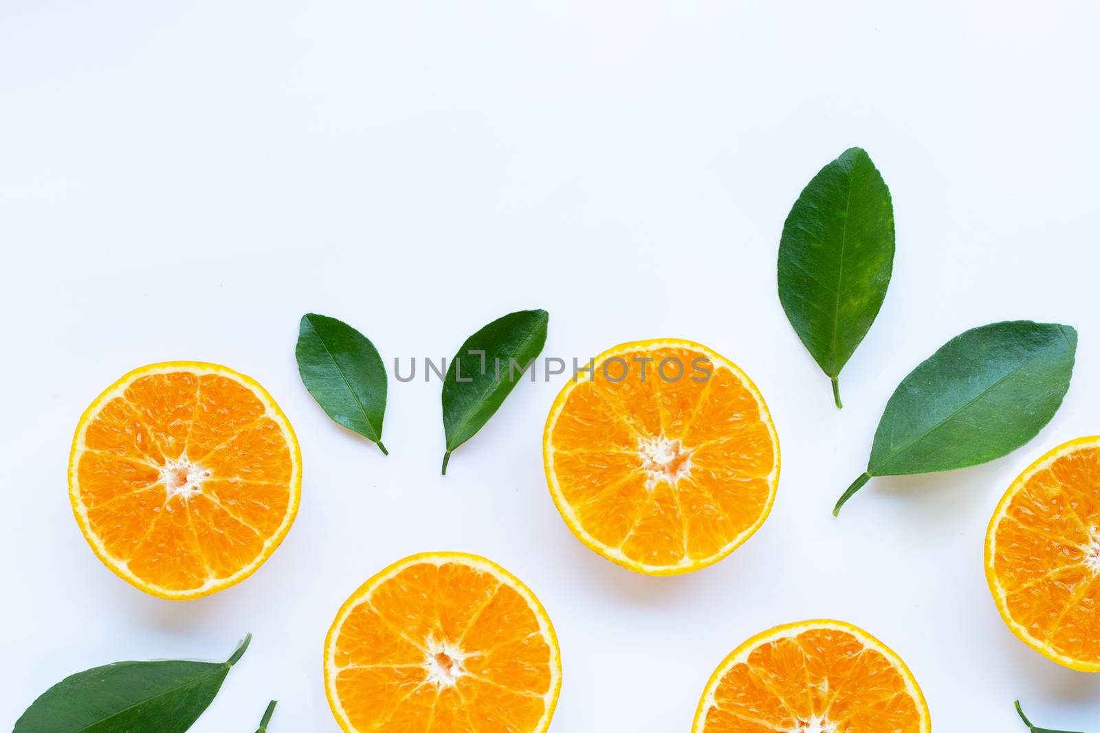 High vitamin C, Orange fruits with leaves on white background. Coppy space