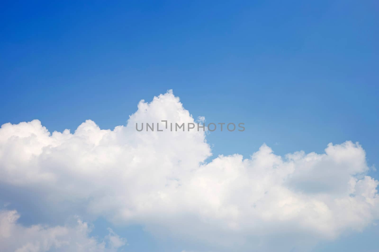 Blue sky background with cloud. Copy space