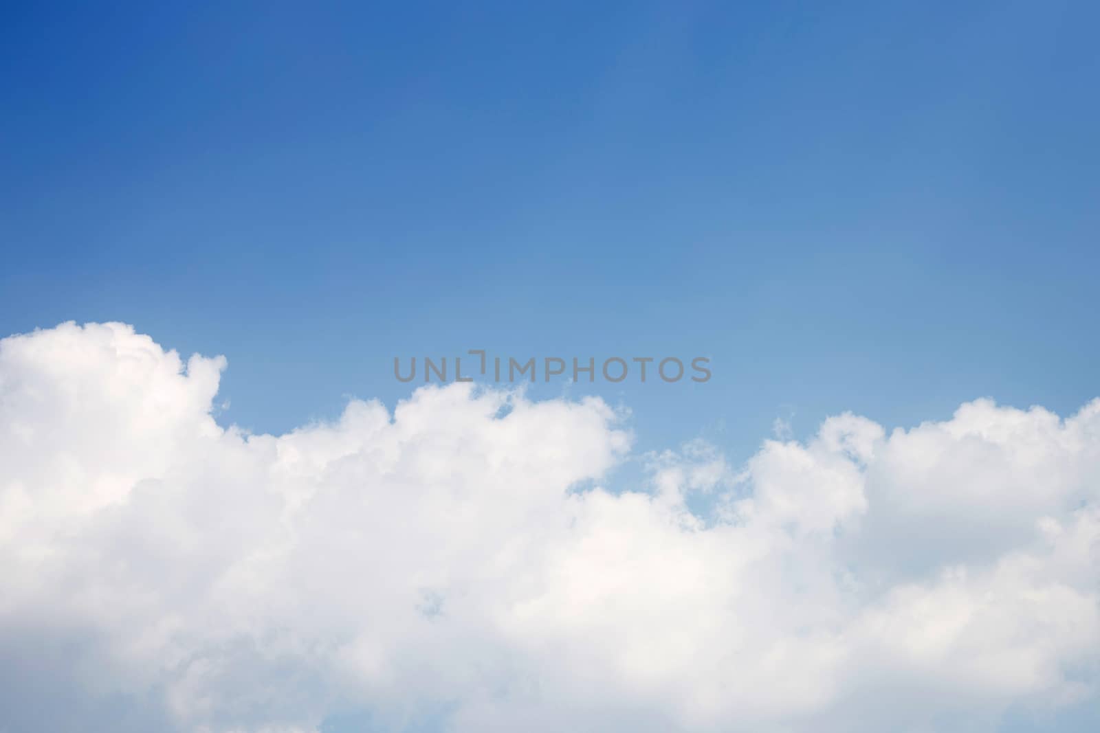 Blue sky background with cloud. Copy space