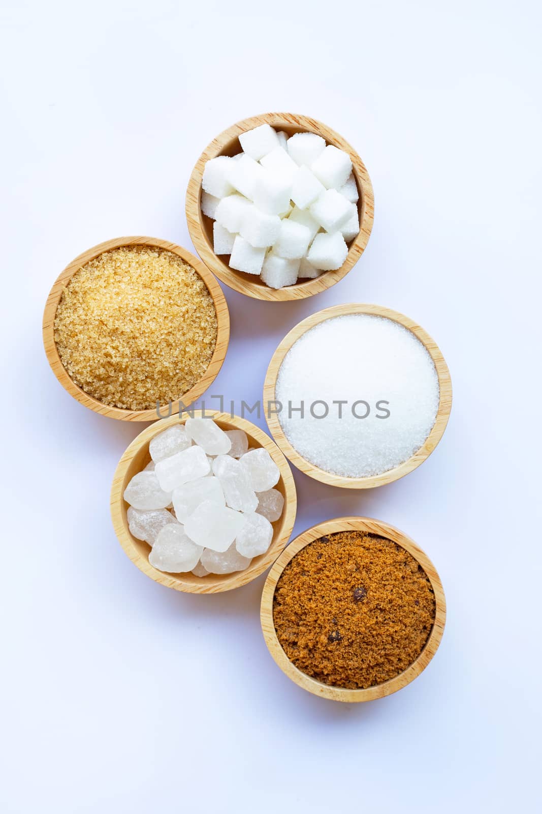 Various types of sugar on white. by Bowonpat