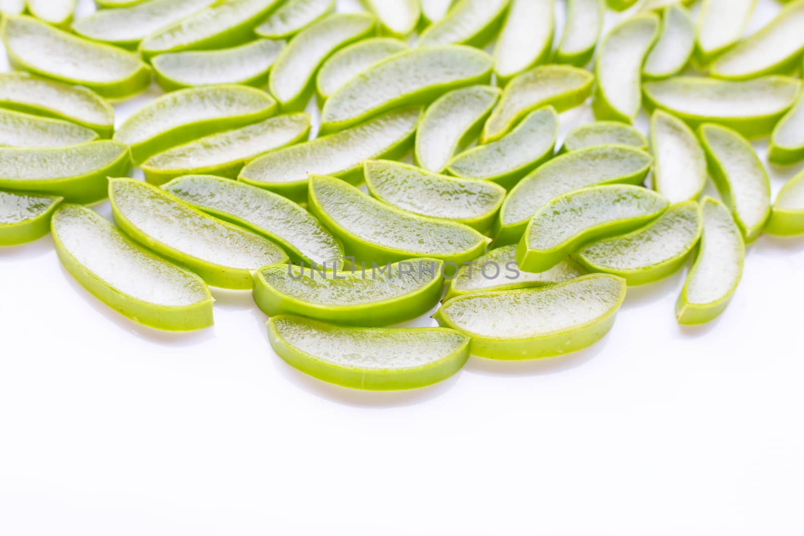 Aloe vera sliced on white background. Copy space