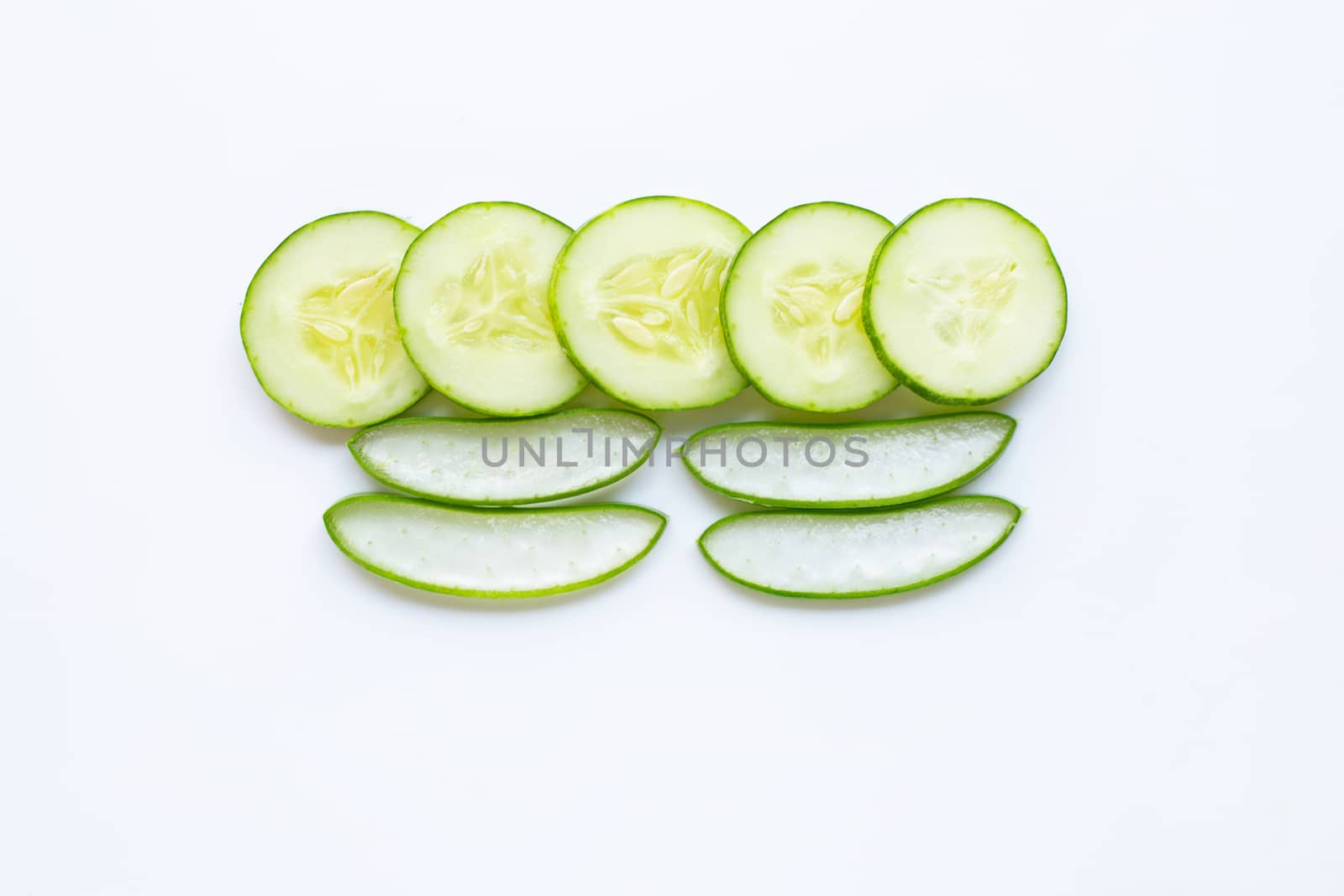 Aloe vera and cucumbers isolated on white background