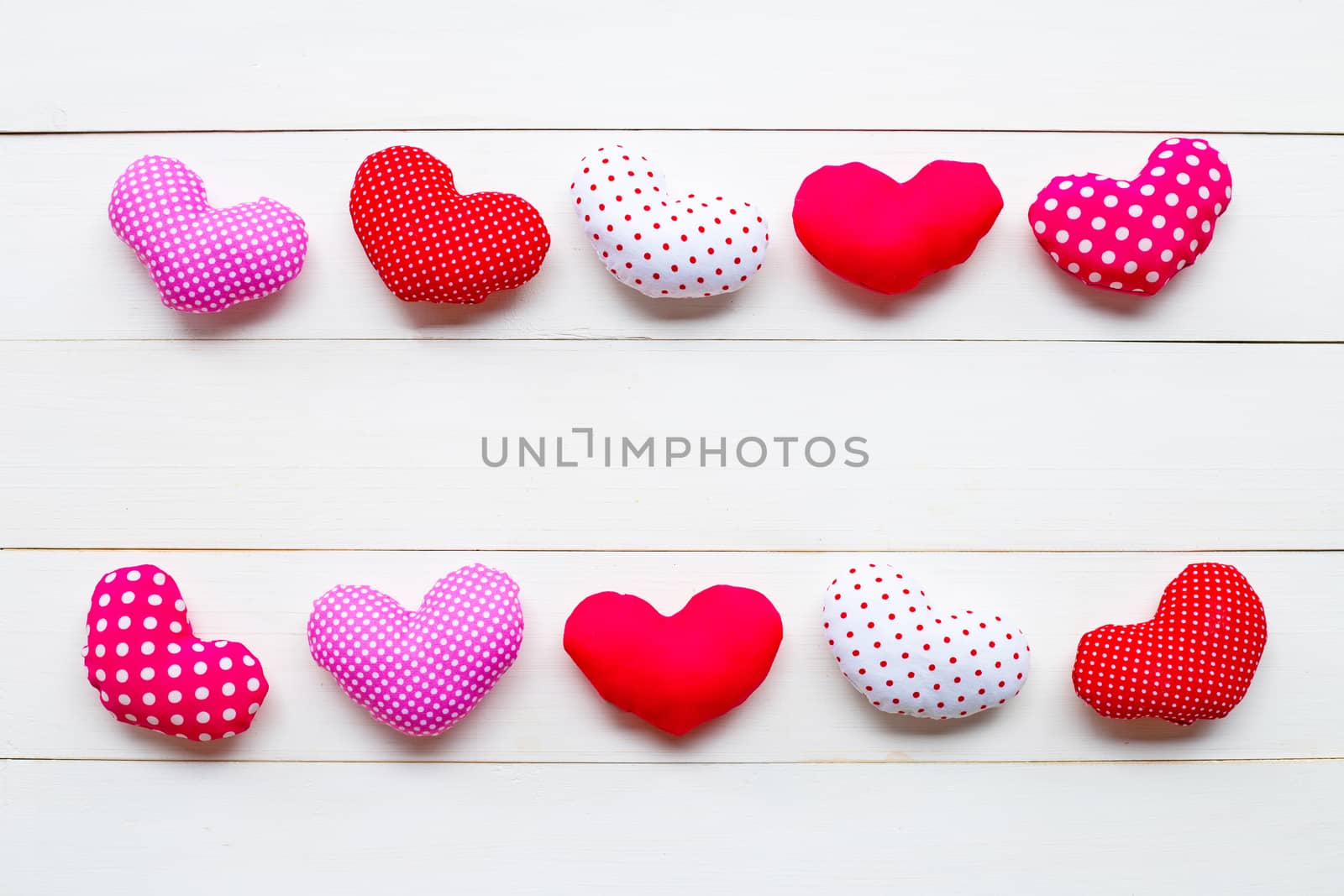 Valentine's hearts on white wooden background. Copy space