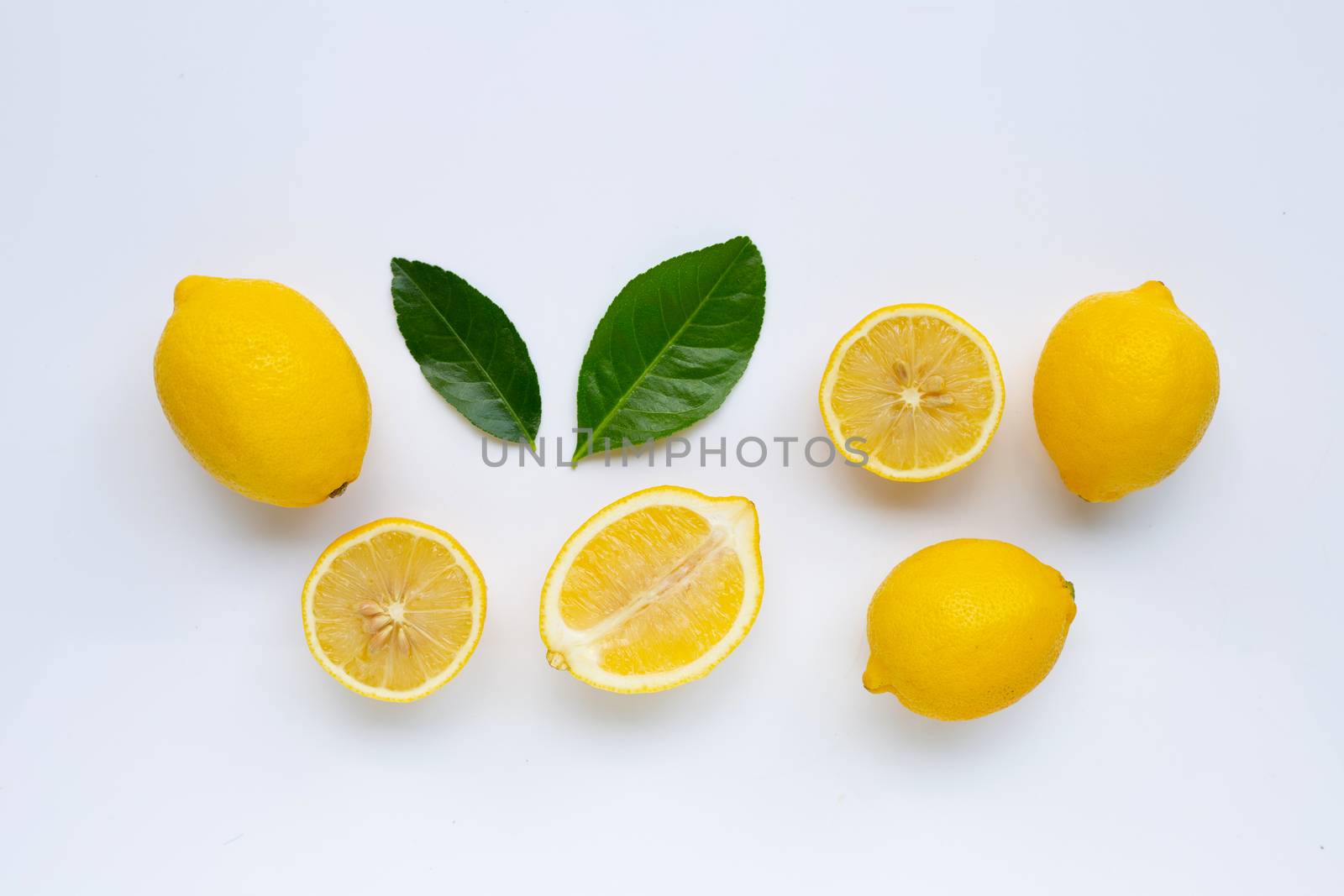 lemon and slices with leaves isolated on white background.