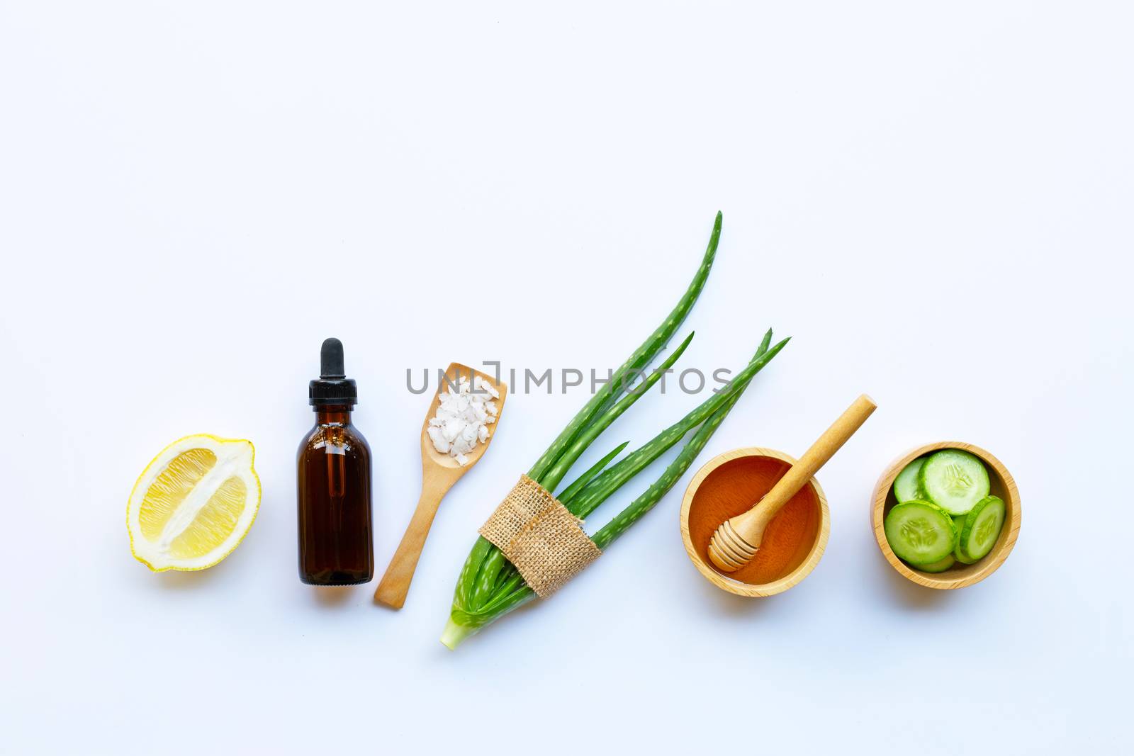 Aloe vera, lemon, cucumber, salt, honey. Natural ingredients for homemade skin care on white
