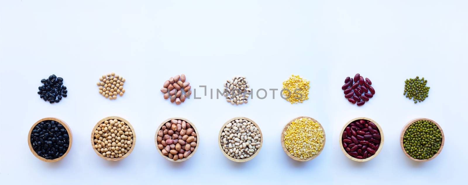 Mixed beans, Different legumes isolated on white background. by Bowonpat