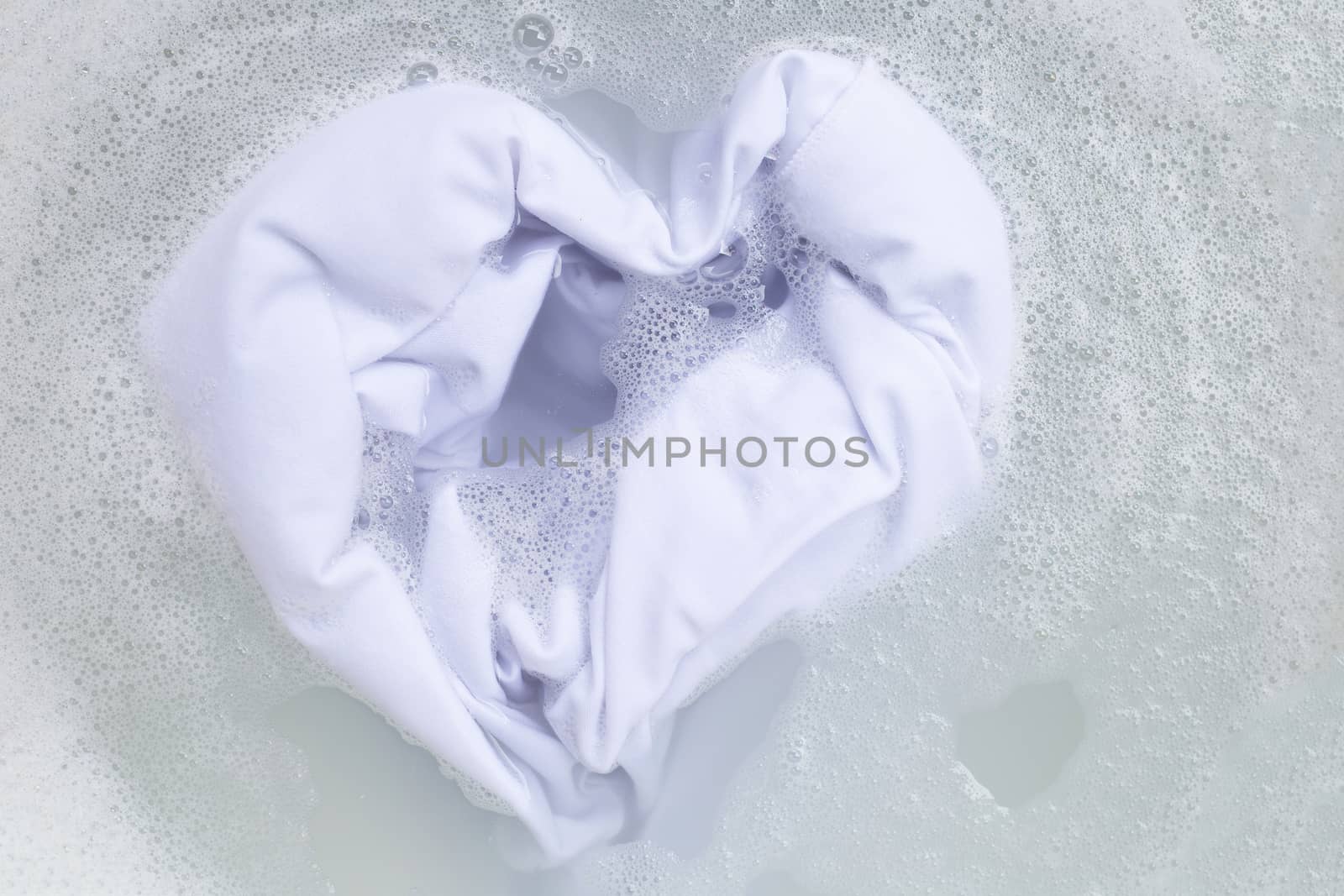 Soak a cloth before washing, white cloth, Heart shape