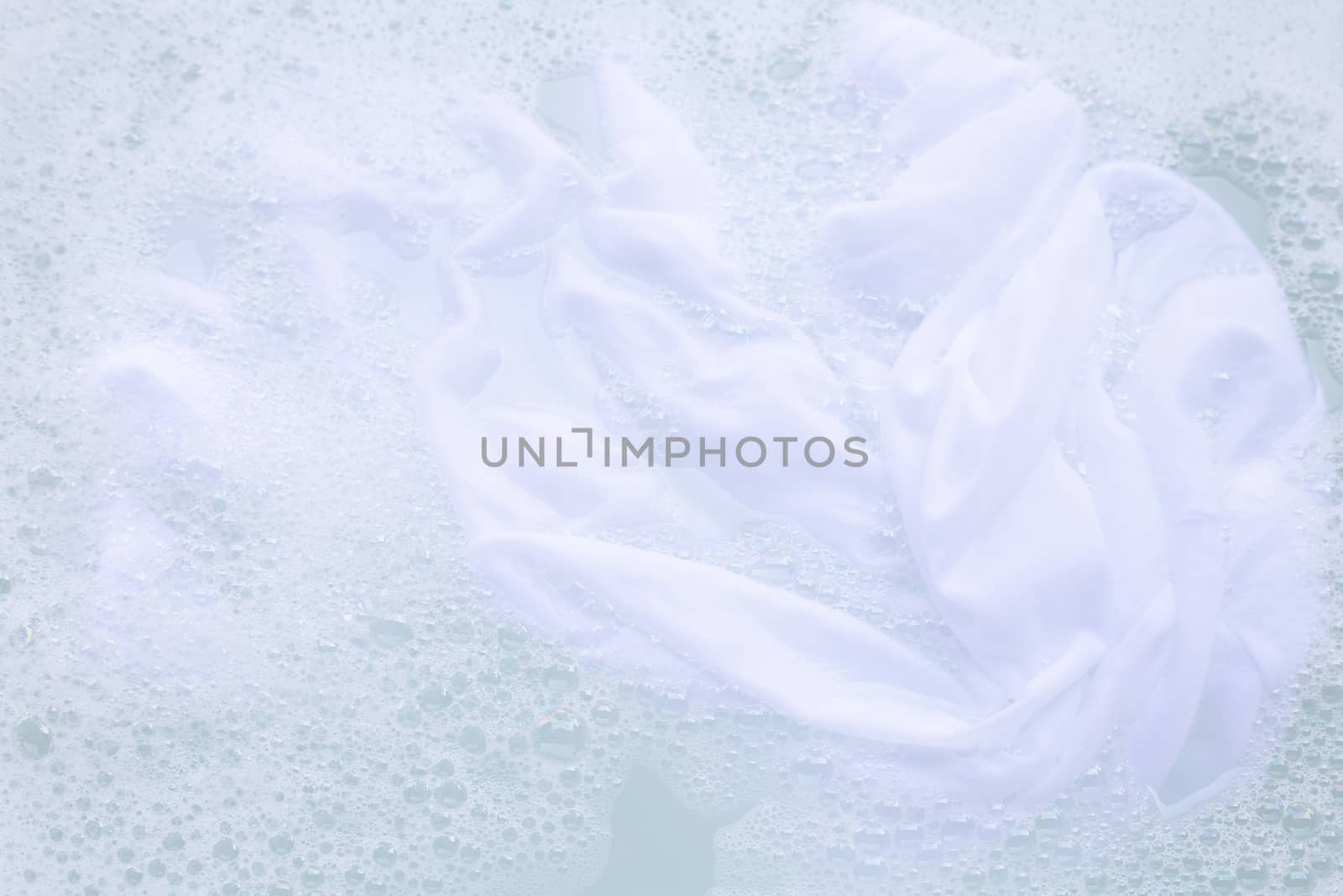 Soak cloth before washing, white cloth by Bowonpat