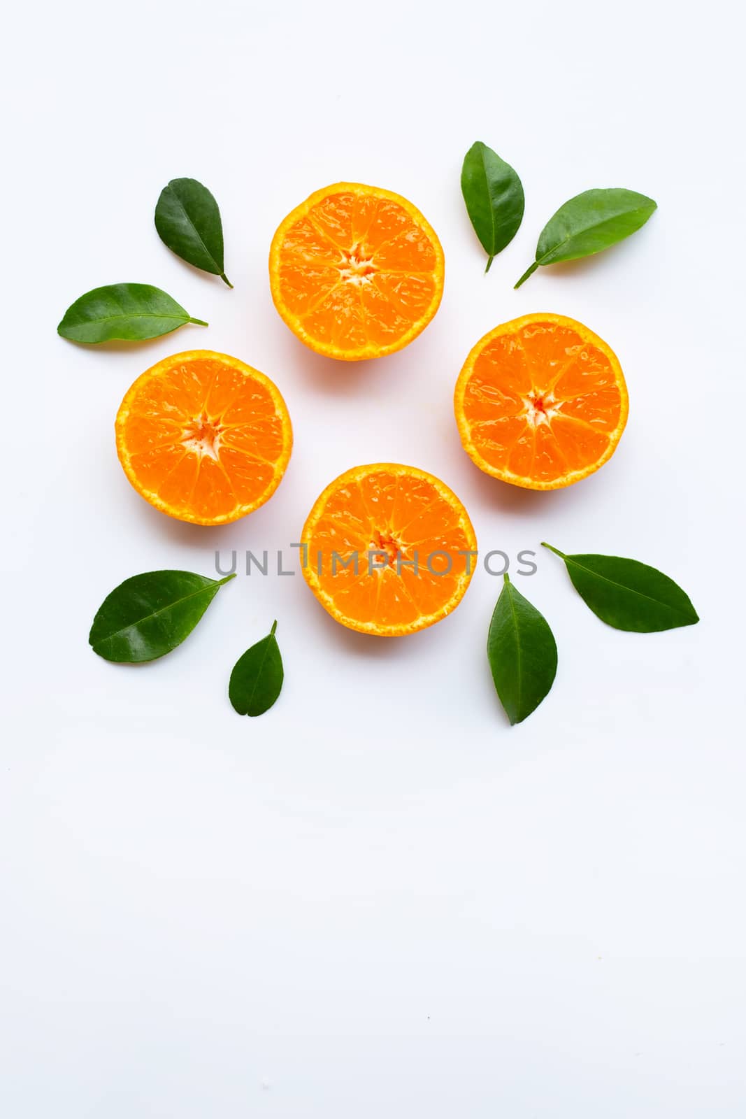 Orange fruits with  leaves on white background.  by Bowonpat