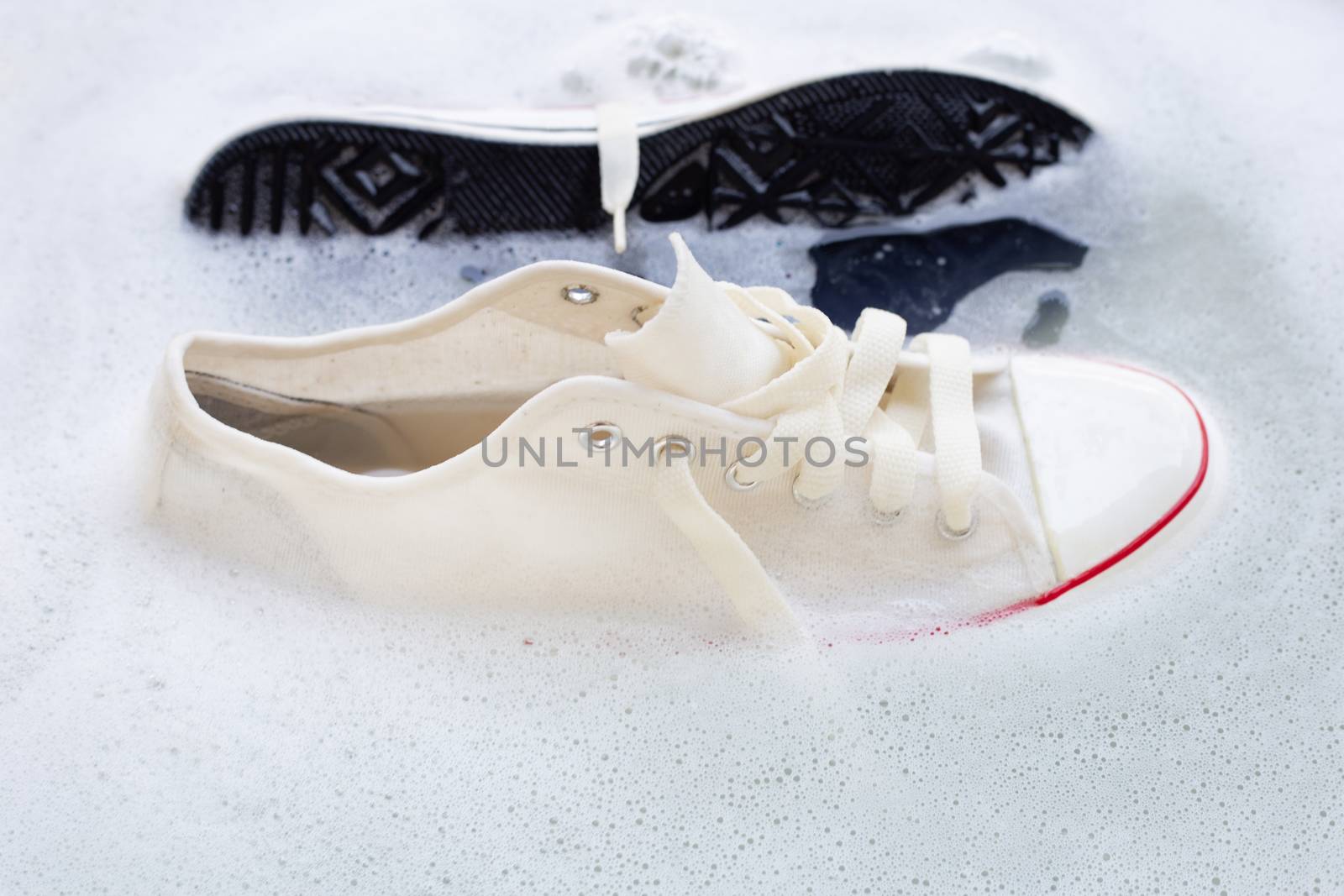 Soak shoes before washing. Cleaning Dirty sneakers.