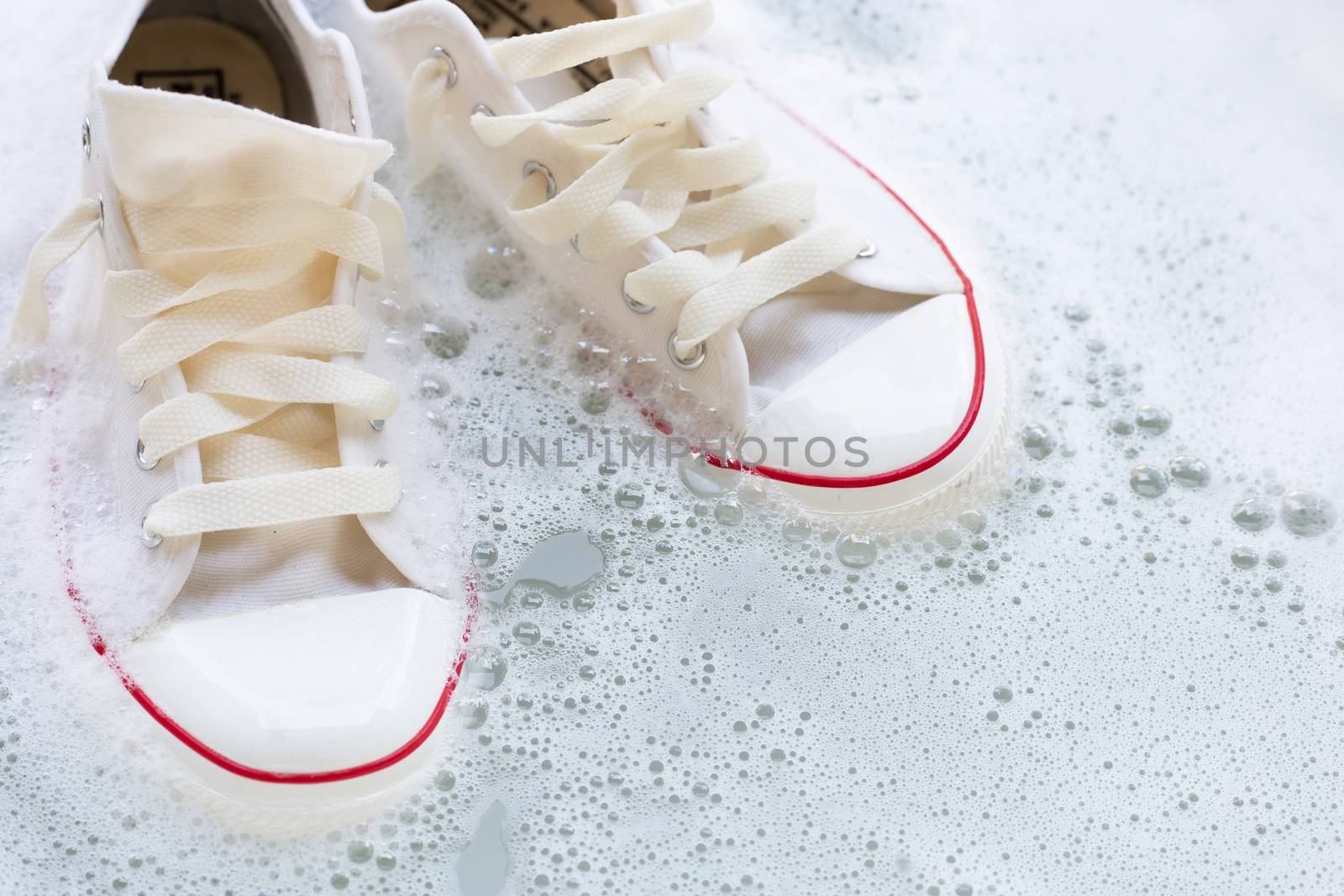 Soak shoes before washing. Cleaning Dirty sneakers.