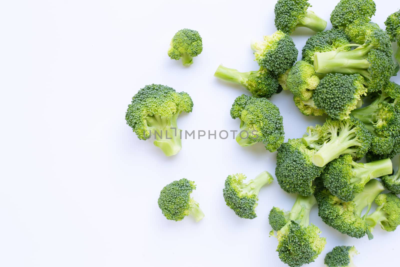 Fresh green broccoli on white  by Bowonpat