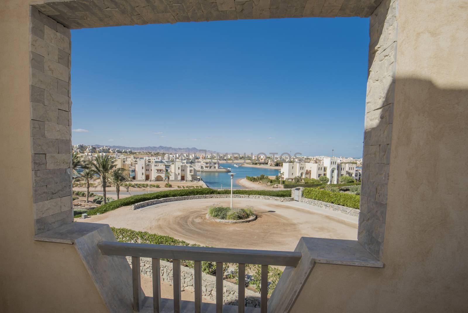 View from balcony of luxury villa in tropical resort with sea view