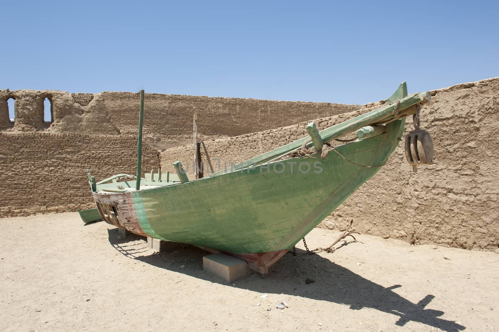 Old traditional egyptian fishing felluca boat on land