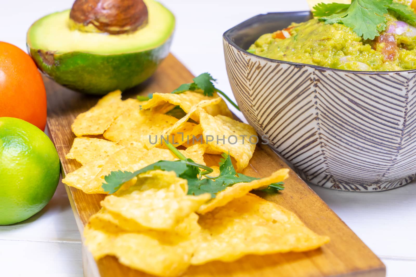 serve of Maxian avocado guacamole with chips by junce