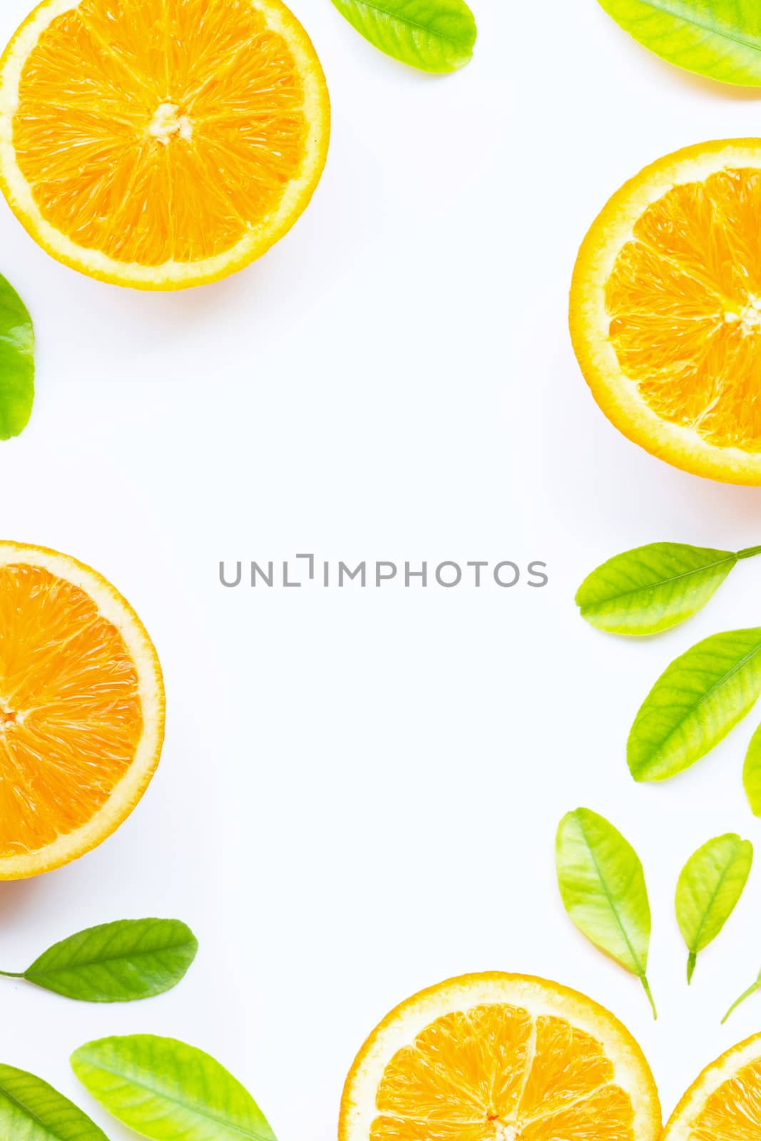 Orange with green leaves isolated on white background. Copy space