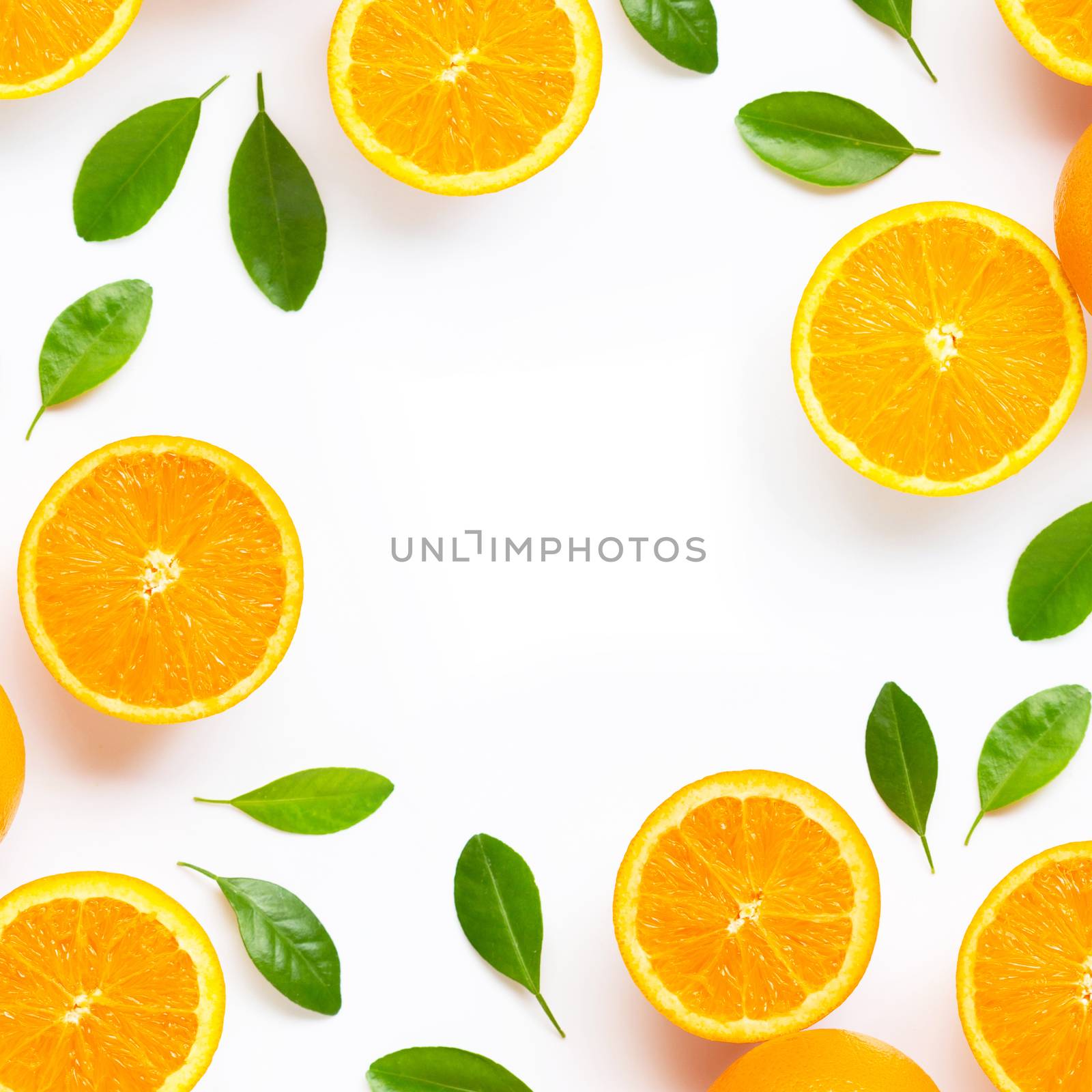 Frame made of fresh orange citrus fruit with leaves isolated on white background. Juicy and sweet. Copy space