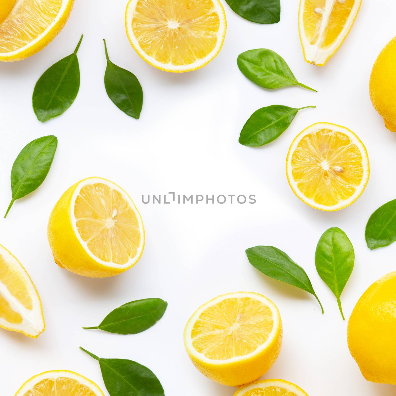 Frame made of fresh lemon and  slices with leaves isolated on wh by Bowonpat
