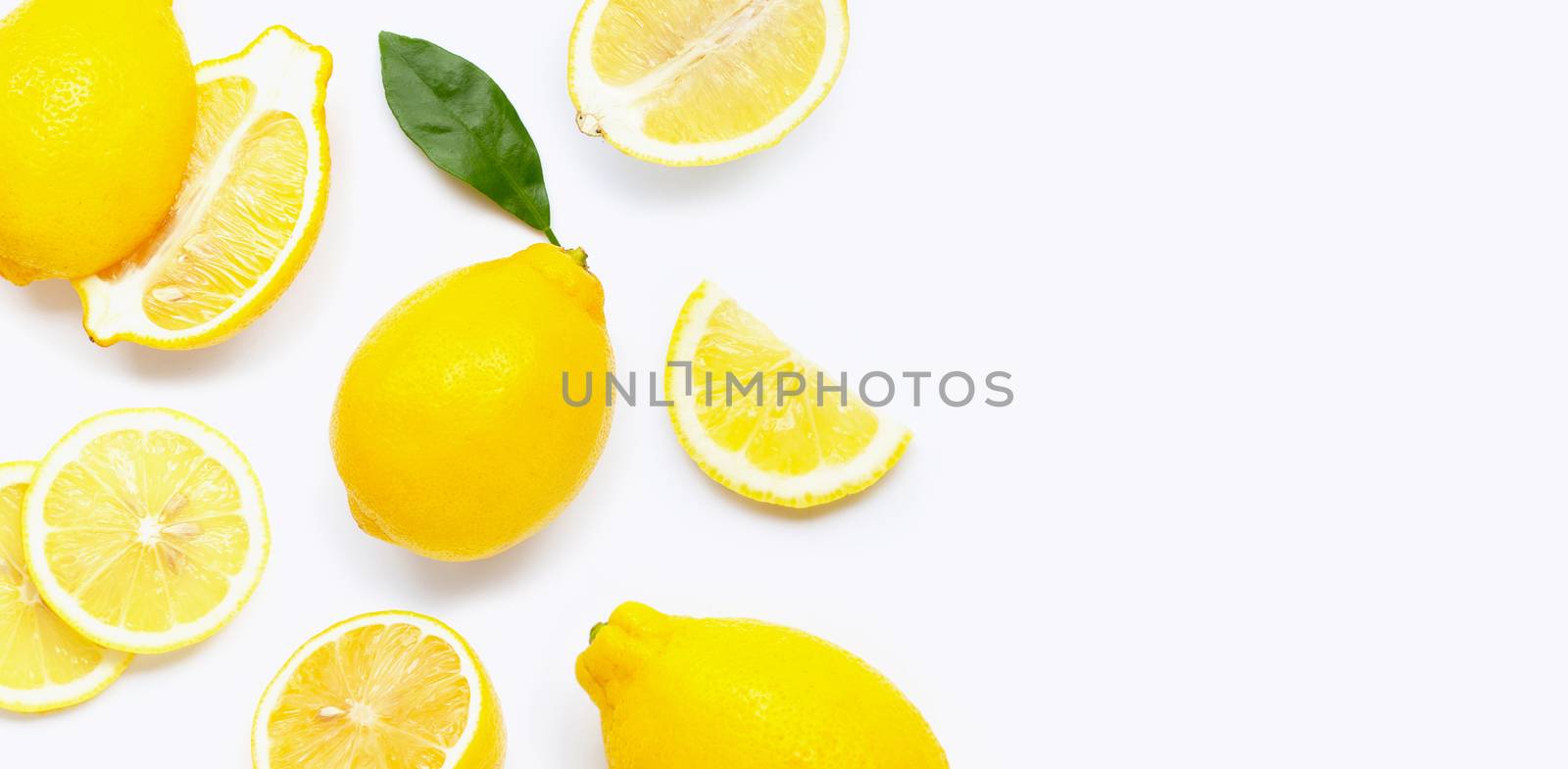 Fresh lemon with slices isolated on white background.