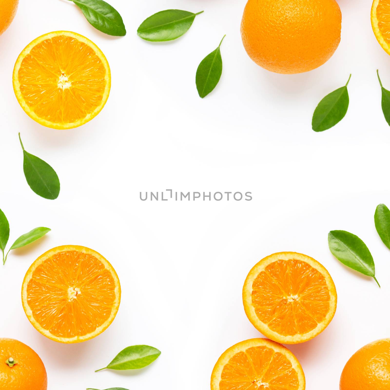 Frame made of fresh orange citrus fruit with leaves isolated on  by Bowonpat