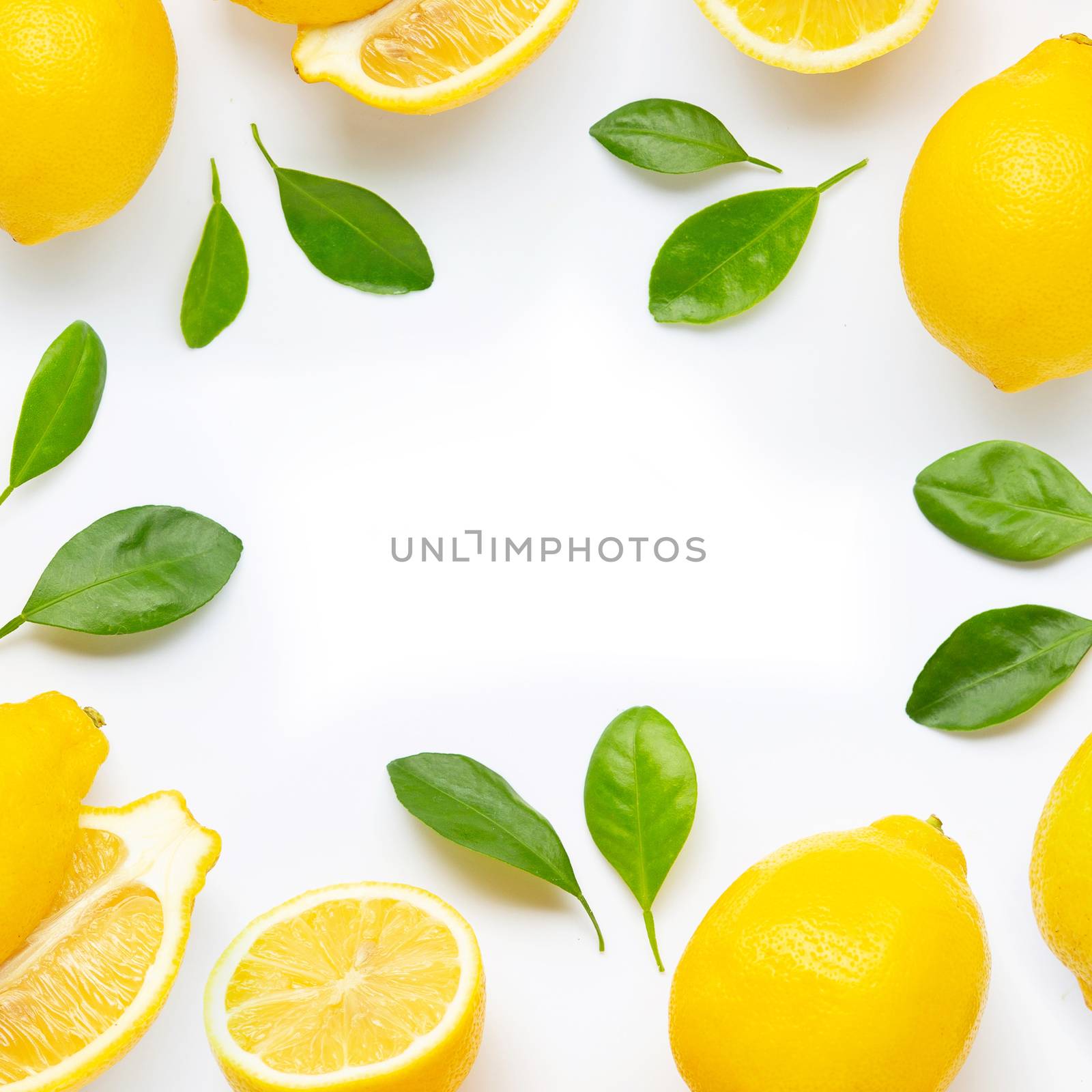 Frame made of fresh lemon and  slices with leaves isolated on wh by Bowonpat