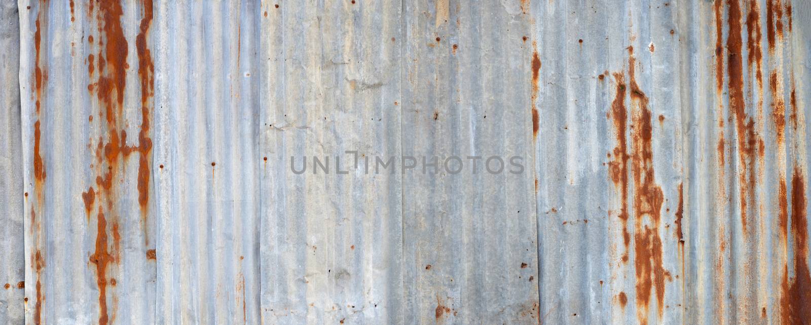 Old rusty zinc sheets for textured background. by Bowonpat