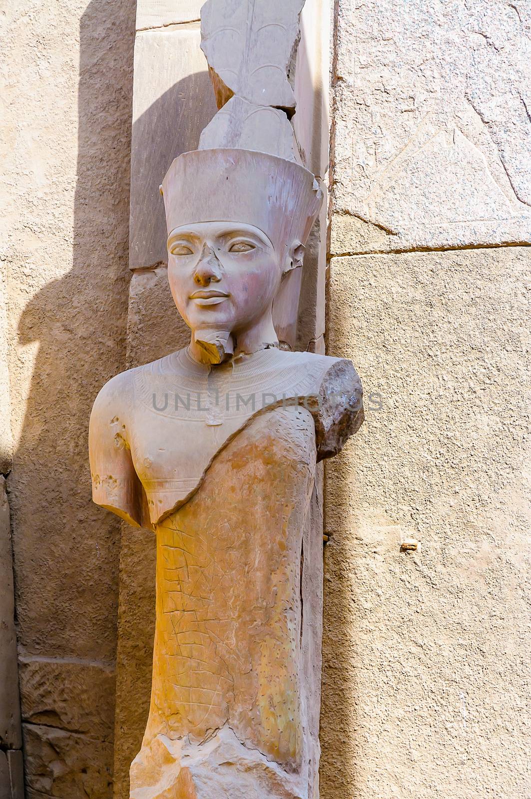 Karnak temple in Luxor, Egypt. Statue of Amun Ra