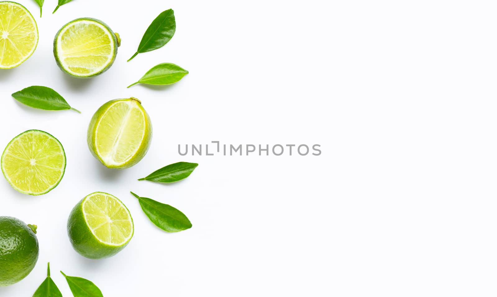 Limes with leaves isolated on white background.